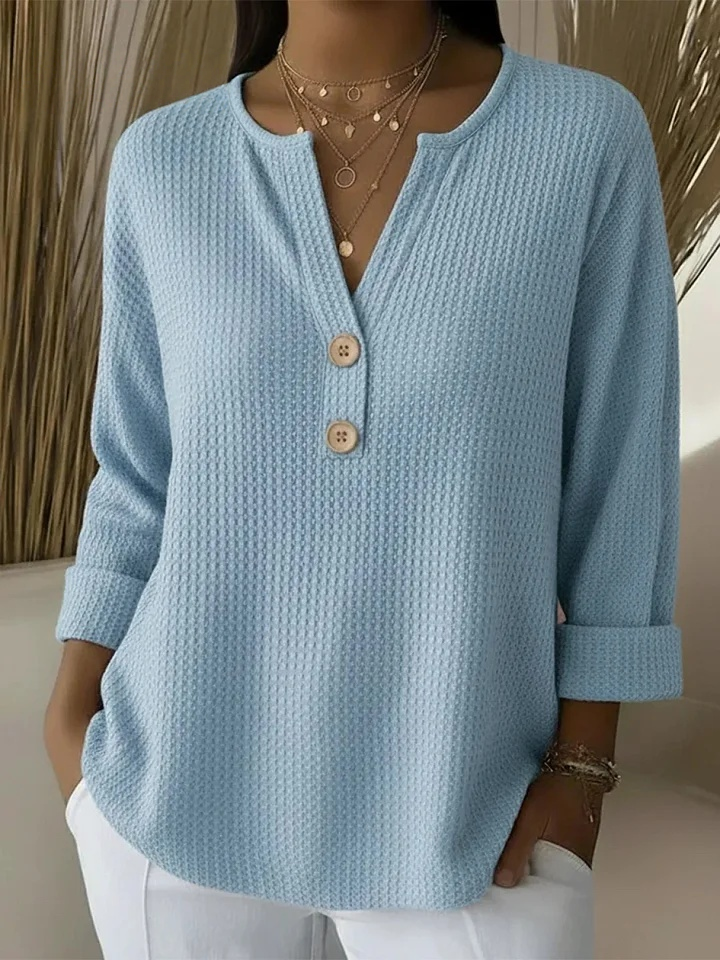 Lucia | Suéter Henley gofrada con botones